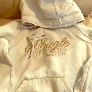 Cream hoodie very soft and warm.